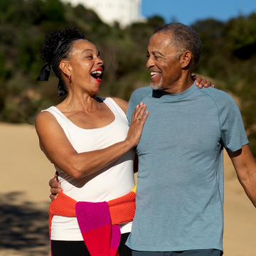 Black couple who use NAD+ looking happy and healthy